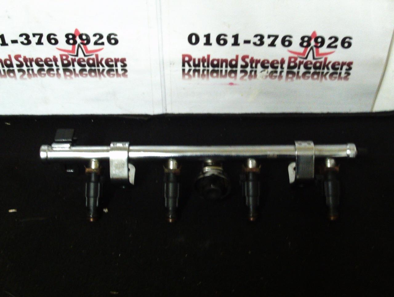 MINI-16-W10-SET-OF-4-FUEL-INJECTORS-WITH-RAIL-04891192AA-04891337AB-142141366446 MINI 1.6 W10 SET OF 4 FUEL INJECTORS WITH RAIL 04891192AA 04891337AB - Image 1